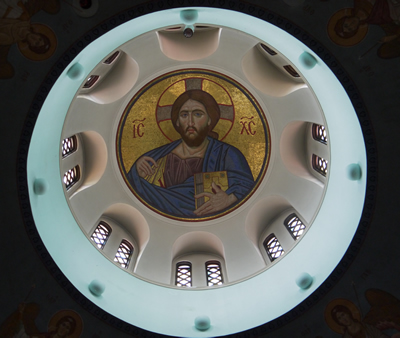 The Christ Pantocrator mosaic in the dome of the church, seen from the nave below.